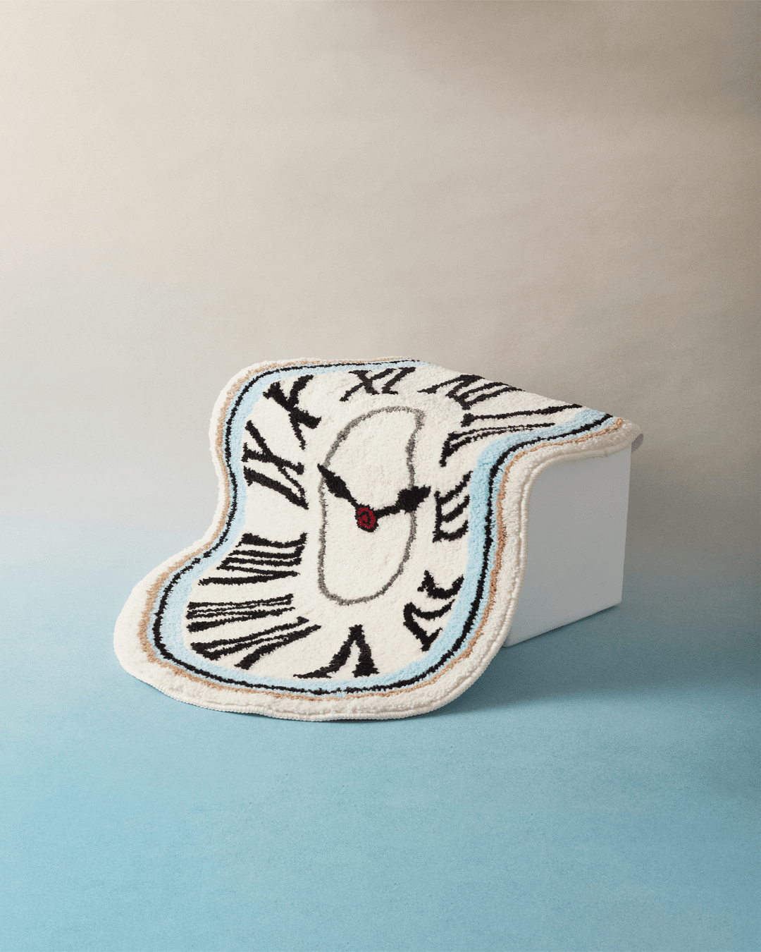 Melting Time flannel area rug cream white Dalí inspired melting clock Hello Pepper