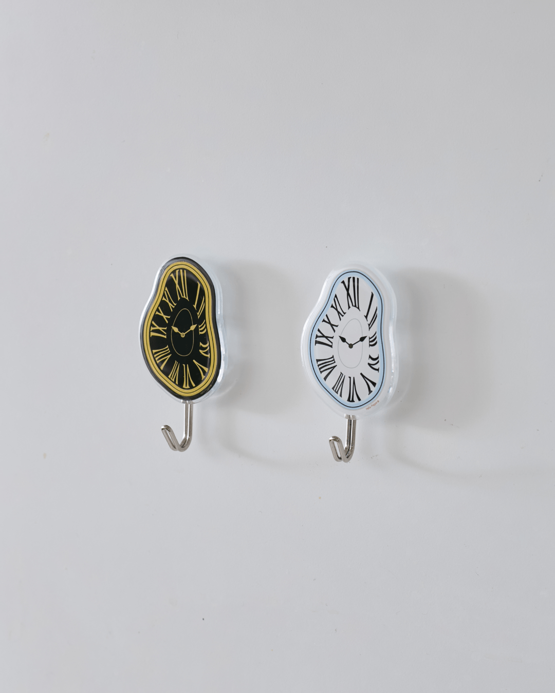 Melting Time resin wall hooks set white black Dalí inspired surrealist Hello Pepper
