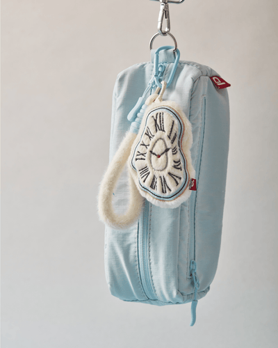 Melting Time plush keychain bag charm cream white baby blue Dalí inspired Hello Pepper