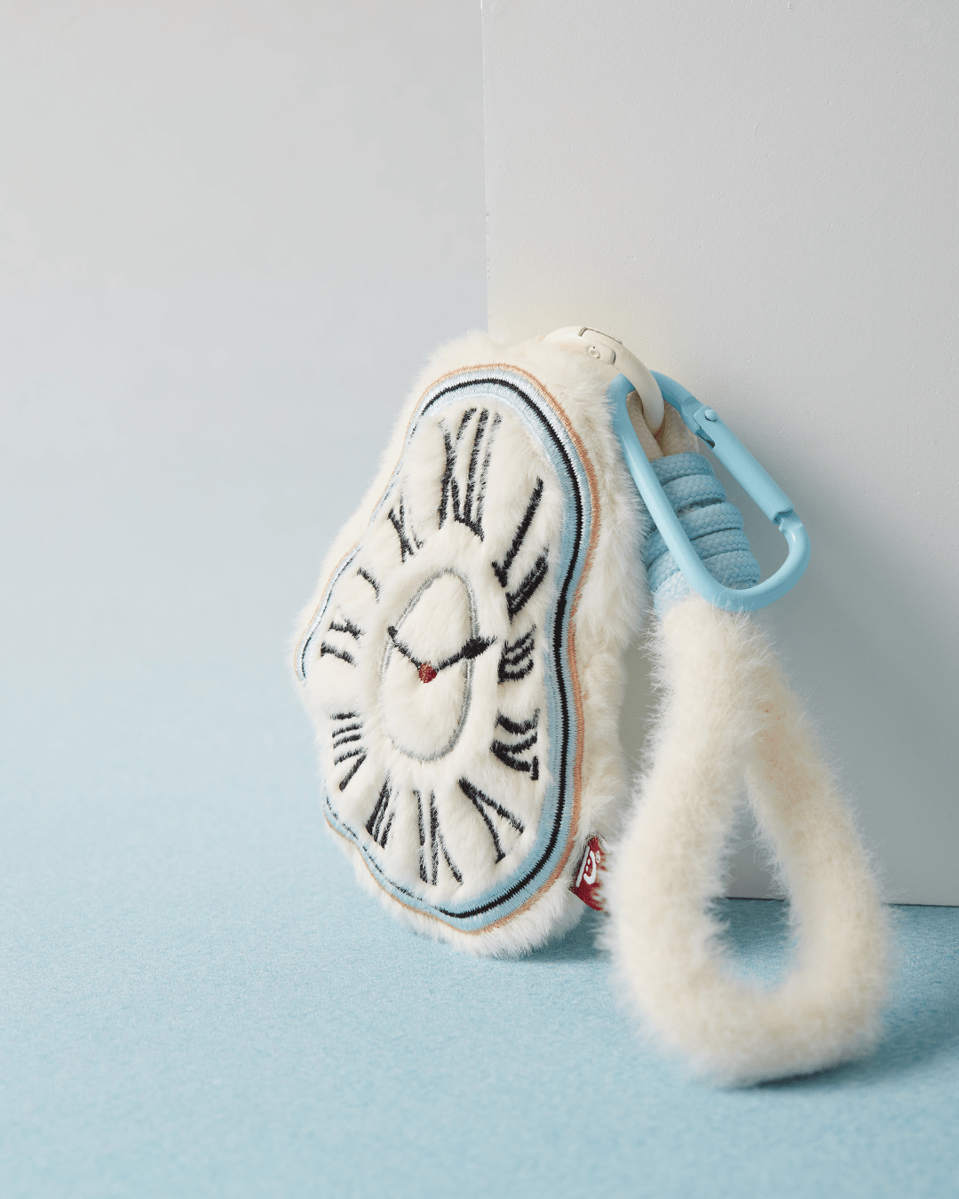 Soft plush keychain embroidered Roman numerals melting clock cream white Hello Pepper