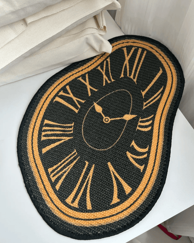 Melting Time sisal cat scratcher mat black gold Dalí inspired draped on furniture Hello Pepper