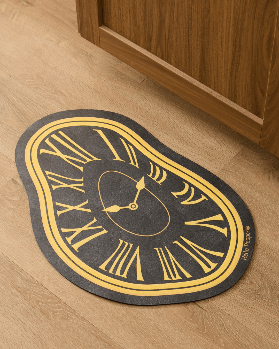 Melting Time stone bath mat black gold diatomaceous earth Dalí inspired Hello Pepper